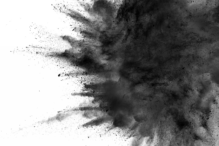 abstract black dust explosion on white background. Spy Weapons