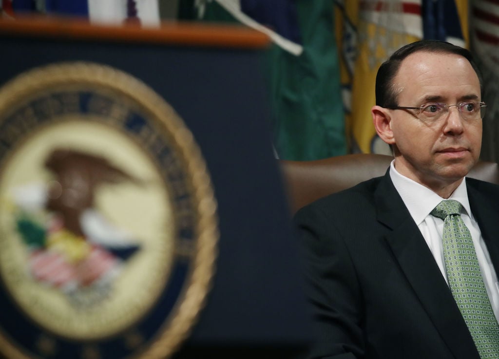 rod rosenstein in front of a department of justice seal rod rosenstein in front of a department of justice seal