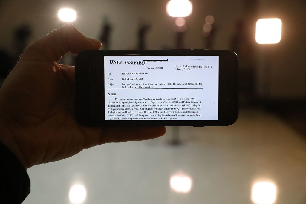 a phone with the text of the nunes memo on it a phone with the text of the nunes memo on it