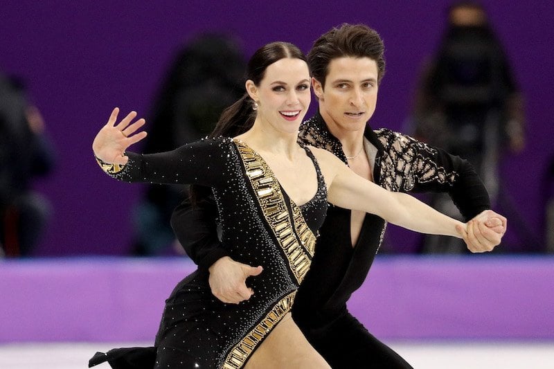 GANGNEUNG, SOUTH KOREA - FEBRUARY 11: Tessa Virtue and Scott Moir of Canada compete in the Figure Skating Team Event - Ice Dance - Short Dance on day two of the PyeongChang 2018 Winter Olympic Games at Gangneung Ice Arena on February 11, 2018 in Gangneung, South Korea. (Photo by Maddie Meyer/Getty Images) GANGNEUNG, SOUTH KOREA - FEBRUARY 11: Tessa Virtue and Scott Moir of Canada compete in the Figure Skating Team Event - Ice Dance - Short Dance on day two of the PyeongChang 2018 Winter Olympic Games at Gangneung Ice Arena on February 11, 2018 in Gangneung, South Korea. (Photo by Maddie Meyer/Getty Images)