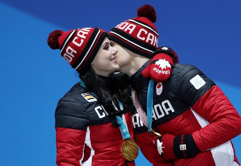 PYEONGCHANG-GUN, SOUTH KOREA - FEBRUARY 20: Gold medalists Tessa Virtue and Scott Moir of Canada celebrate during the medal ceremony for Figure Skating - Ice Dance Free Dance on day 11 of the PyeongChang 2018 Winter Olympic Games at Medal Plaza on February 20, 2018 in Pyeongchang-gun, South Korea. (Photo by Ezra Shaw/Getty Images)