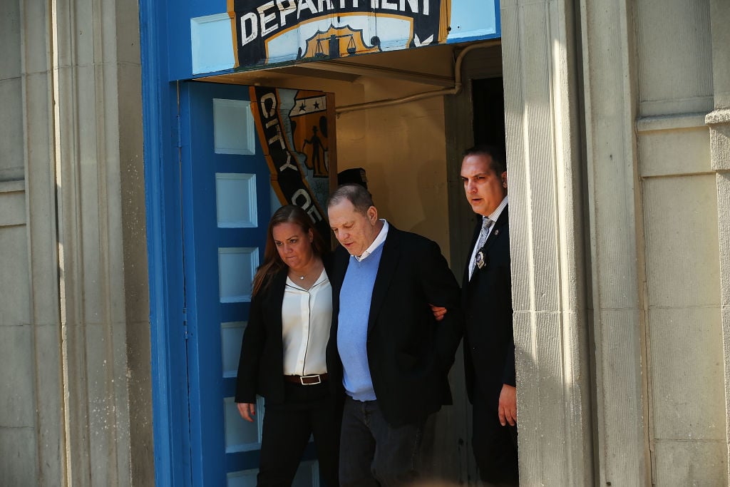 Harvey Weinstein is led out of the New York Police Department's First Precinct in handcuffs after being arrested and processed on charges of rape, committing a criminal sex act, sexual abuse and sexual misconduct on May 25, 2018 in New York City. | Spencer Platt/Getty Images Harvey Weinstein is led out of the New York Police Department's First Precinct in handcuffs after being arrested and processed on charges of rape, committing a criminal sex act, sexual abuse and sexual misconduct on May 25, 2018 in New York City.