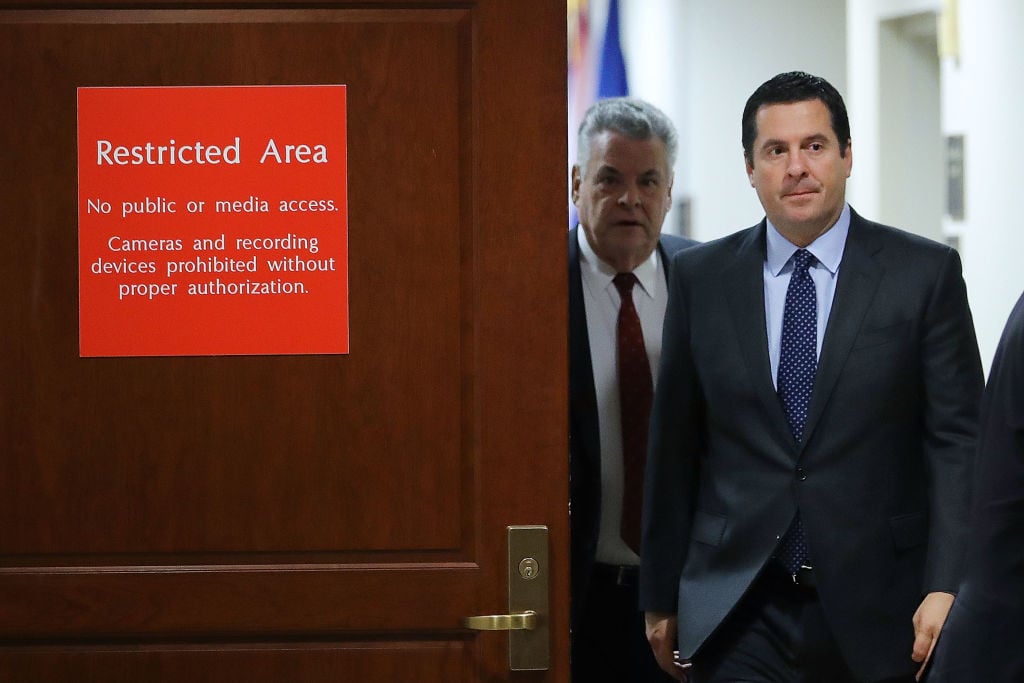 Chairman Devin Nunes and Rep. Peter King leave the committee's secure meeting rooms in the basement of the U.S. Capitol House Visitors Center