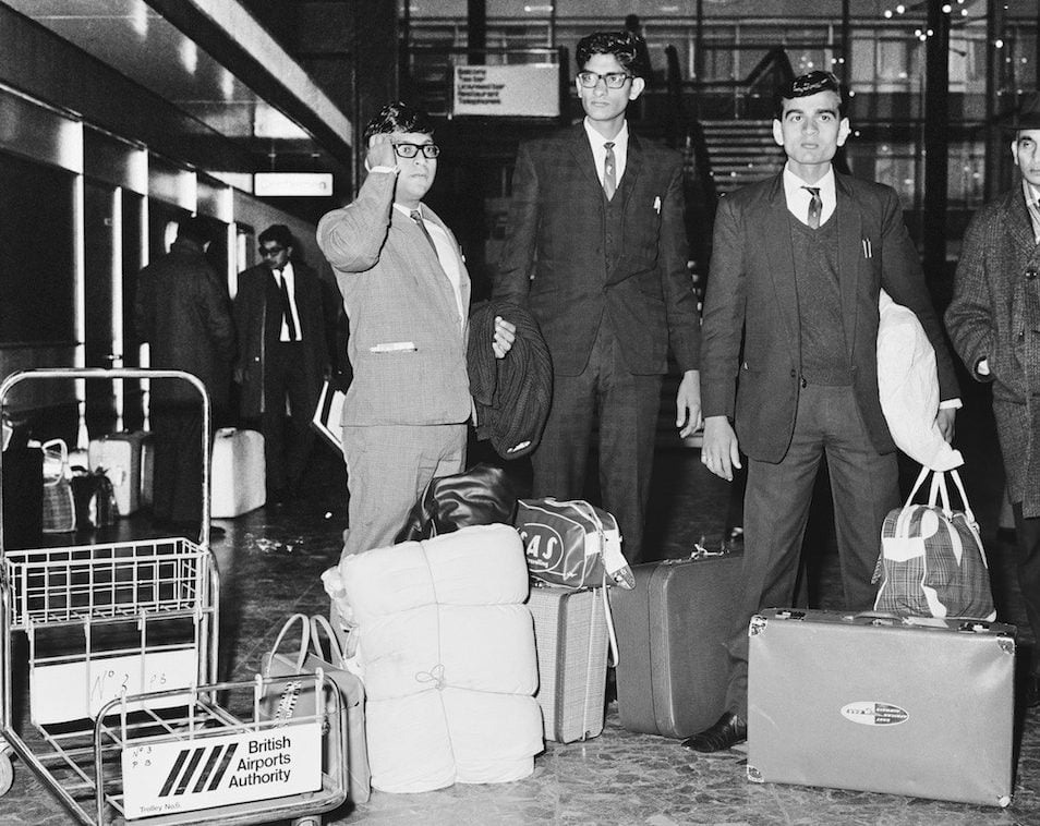 A group of immigrants arrive at London Airport