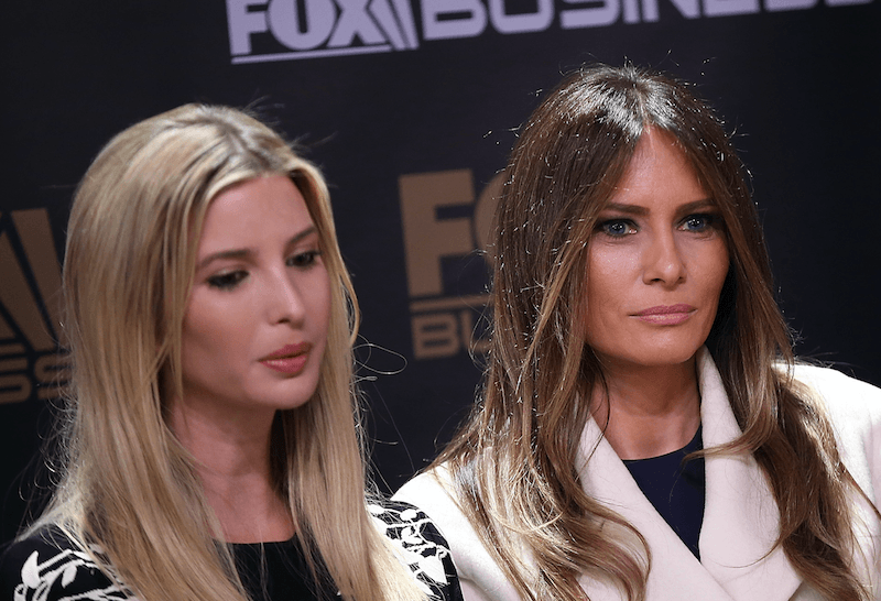 Ivanka and Melania Trump attend a press event.