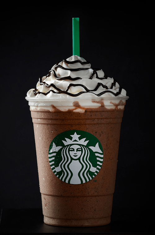 A java chip frappuccino on a black background. A java chip frappuccino on a black background.