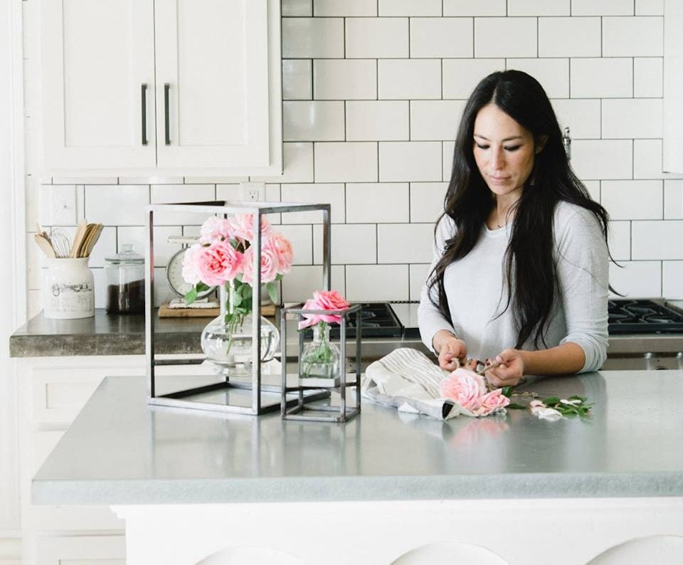 Joanna Gaines cutting flowers for vases