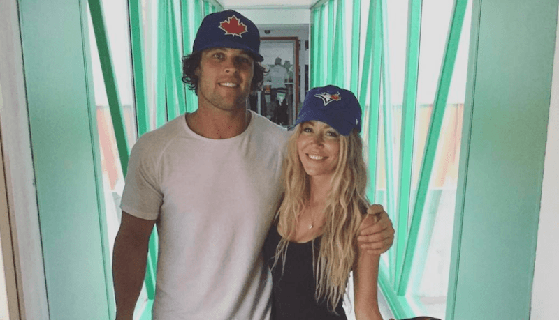 Kevin Wendt and his ex-girlfriend wearing matching baseball caps. Kevin Wendt and his ex-girlfriend wearing matching baseball caps.