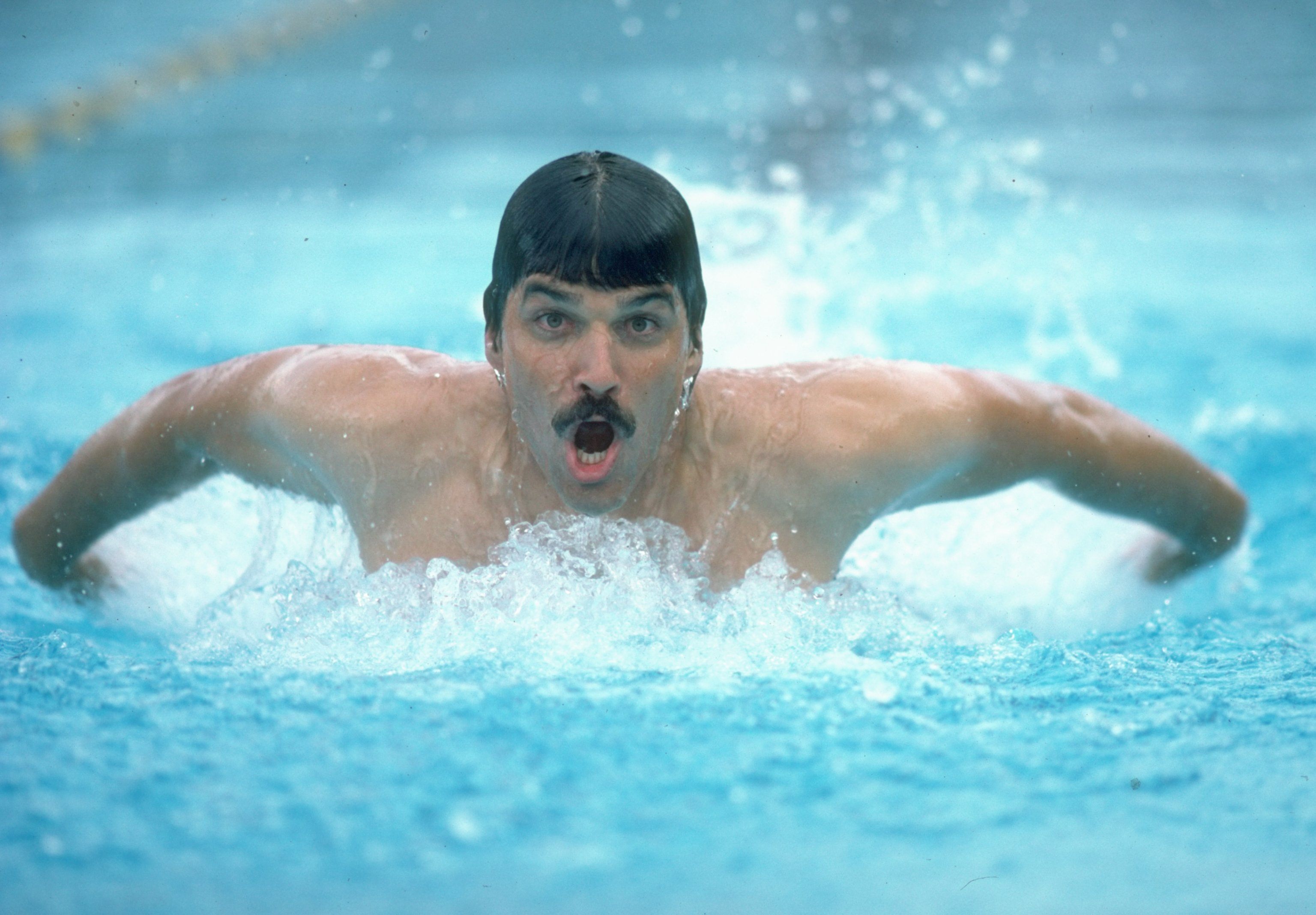 Mark Spitz swimming without goggles or a swim cap