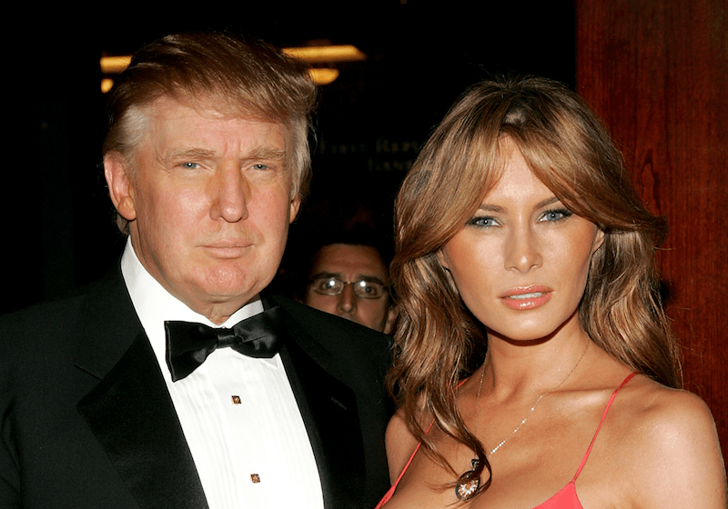 Donald Trump and Melania Trump standing together at a formal party.