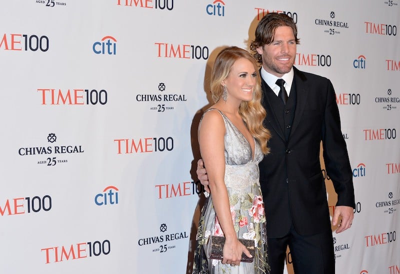 Carrie Underwood posing with Mike Fisher. Carrie Underwood posing with Mike Fisher.