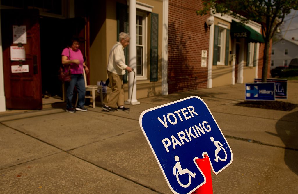 Voters walk to their polling stations to vote in the primary election on April 26, 2016 in Oakmont, Pennsylvania