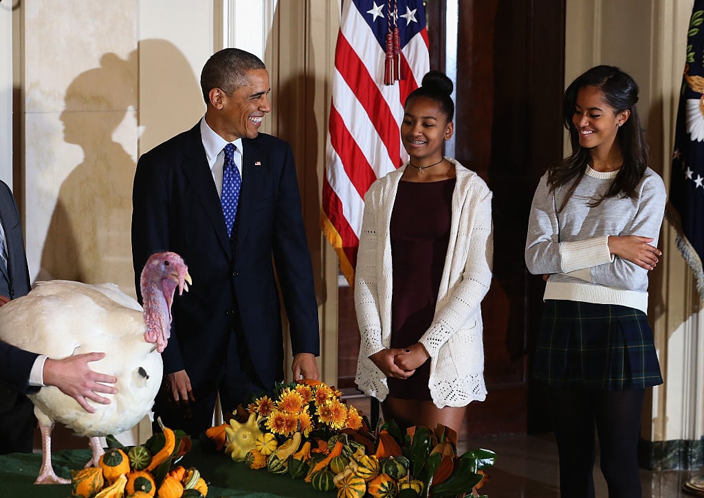 President Obama Pardons National Thanksgiving Turkey At Annual Ceremony with Sasha and Malia.