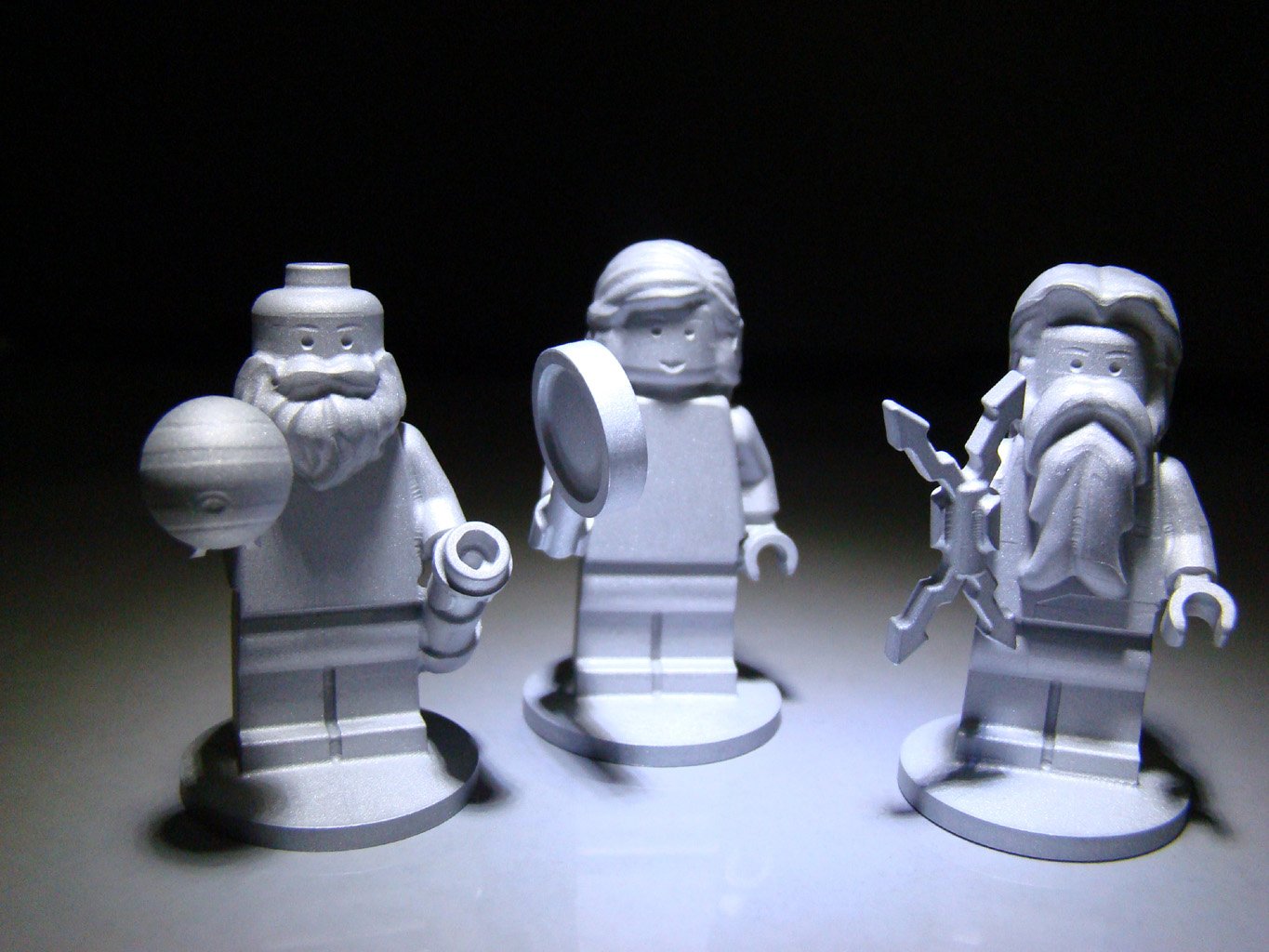 Three Lego figurines of Galileo, Juno, and Jupiter.