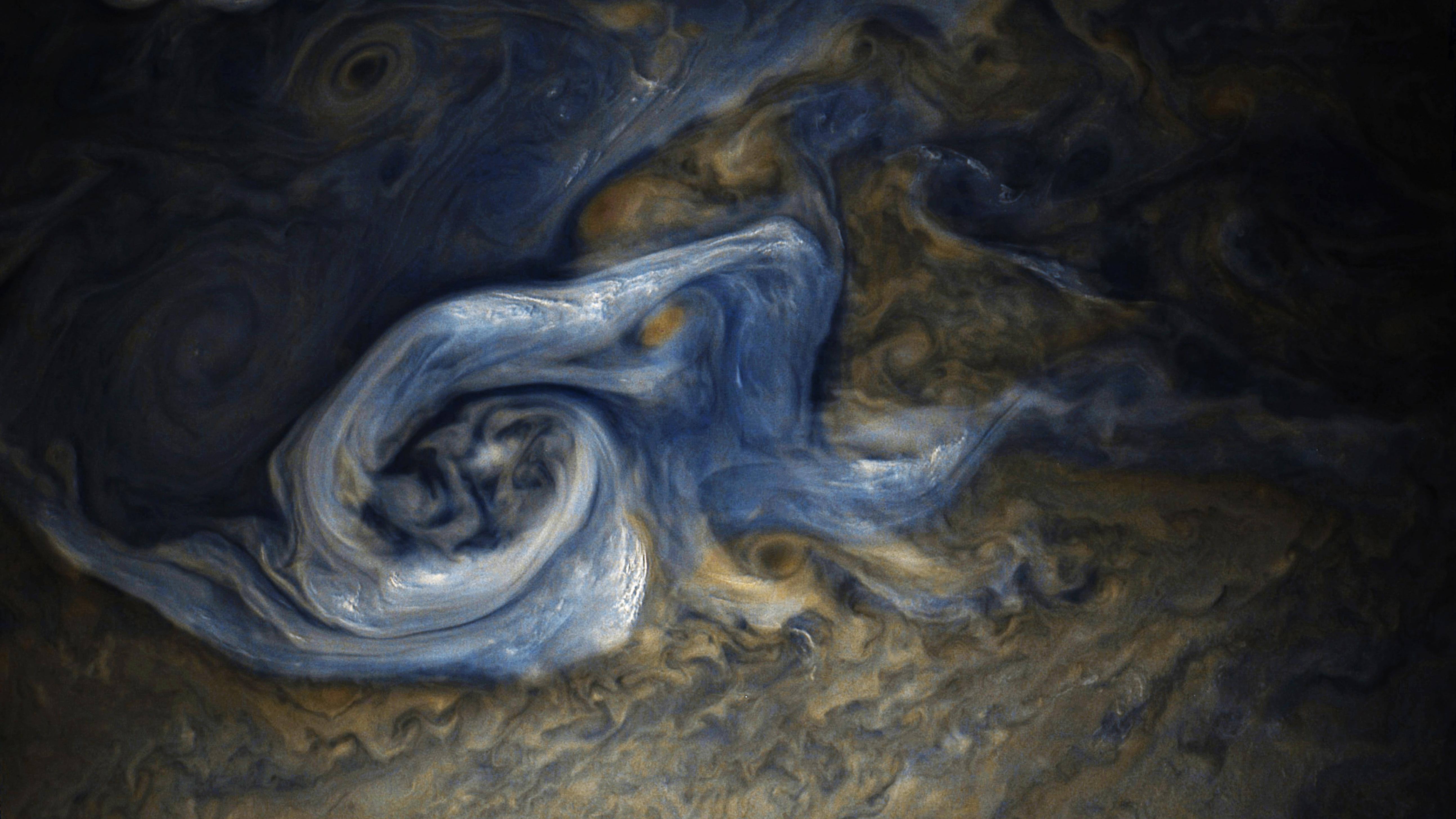This color-enhanced image of a massive, raging storm in Jupiter's northern hemisphere was captured by NASA's Juno spacecraft during its ninth close flyby of the gas giant planet. This color-enhanced image of a massive, raging storm in Jupiter's northern hemisphere was captured by NASA's Juno spacecraft during its ninth close flyby of the gas giant planet.