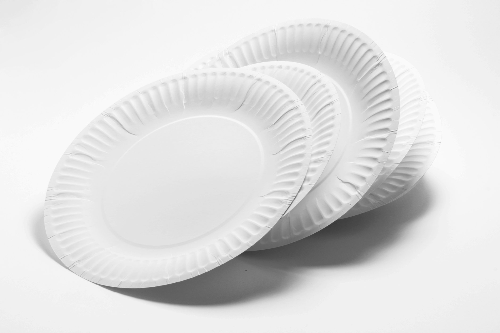 Stack of Paper Plates on Seamless Background