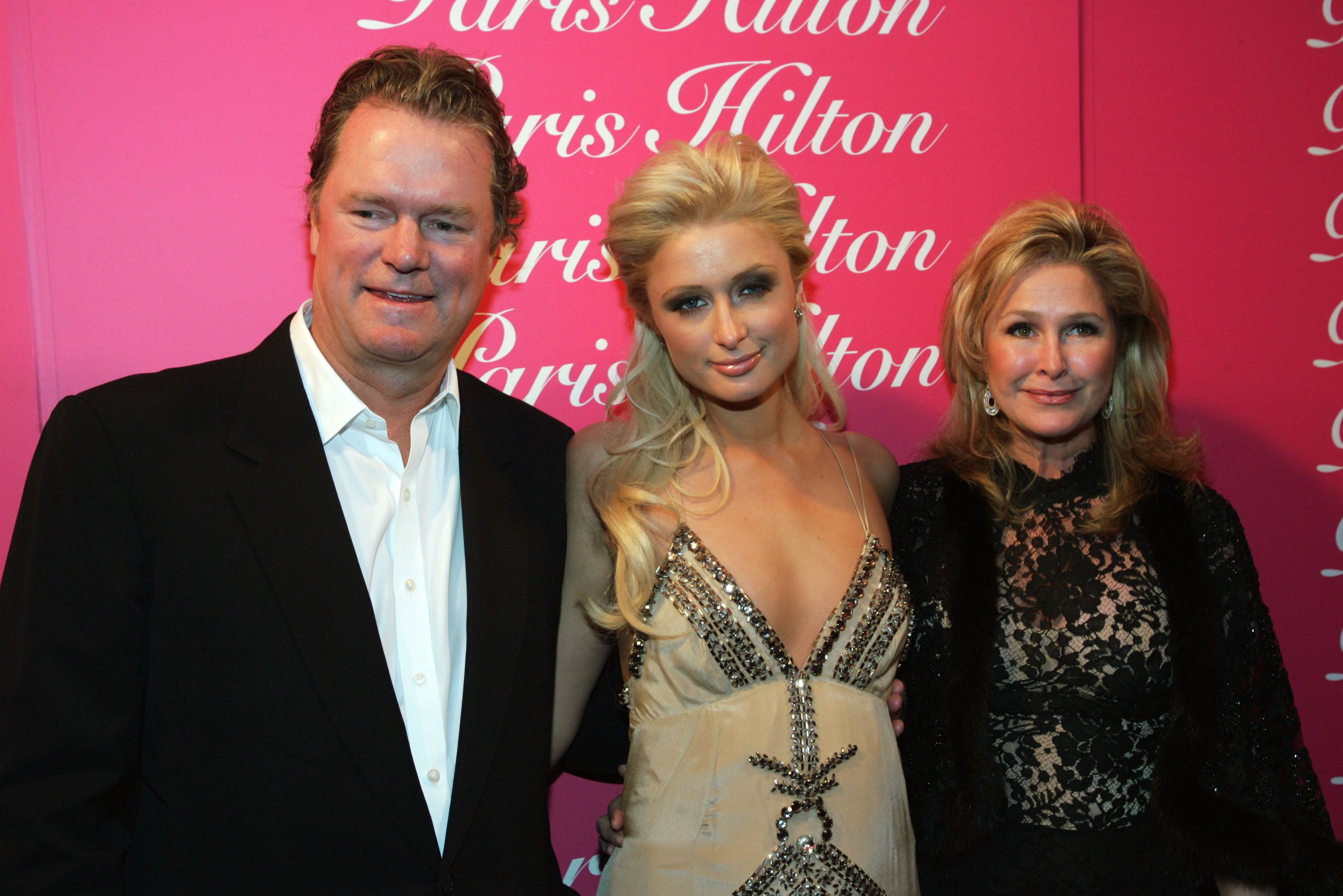 Paris Hilton with her parents Rick and Kathy
