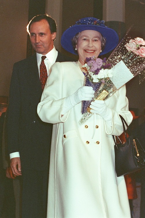 Paul Keating walking behind Queen Elizabeth. Paul Keating walking behind Queen Elizabeth.