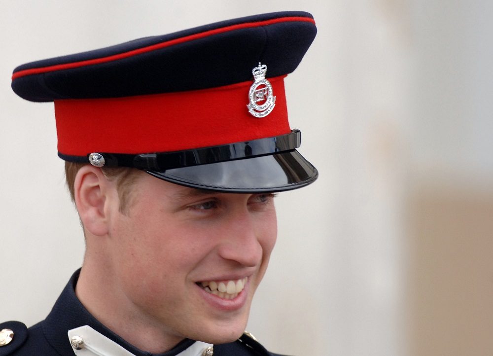 Prince William smiles at the passing-out Sovereign's Parade