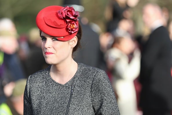 Princess Eugenie in a red hat. Princess Eugenie in a red hat.