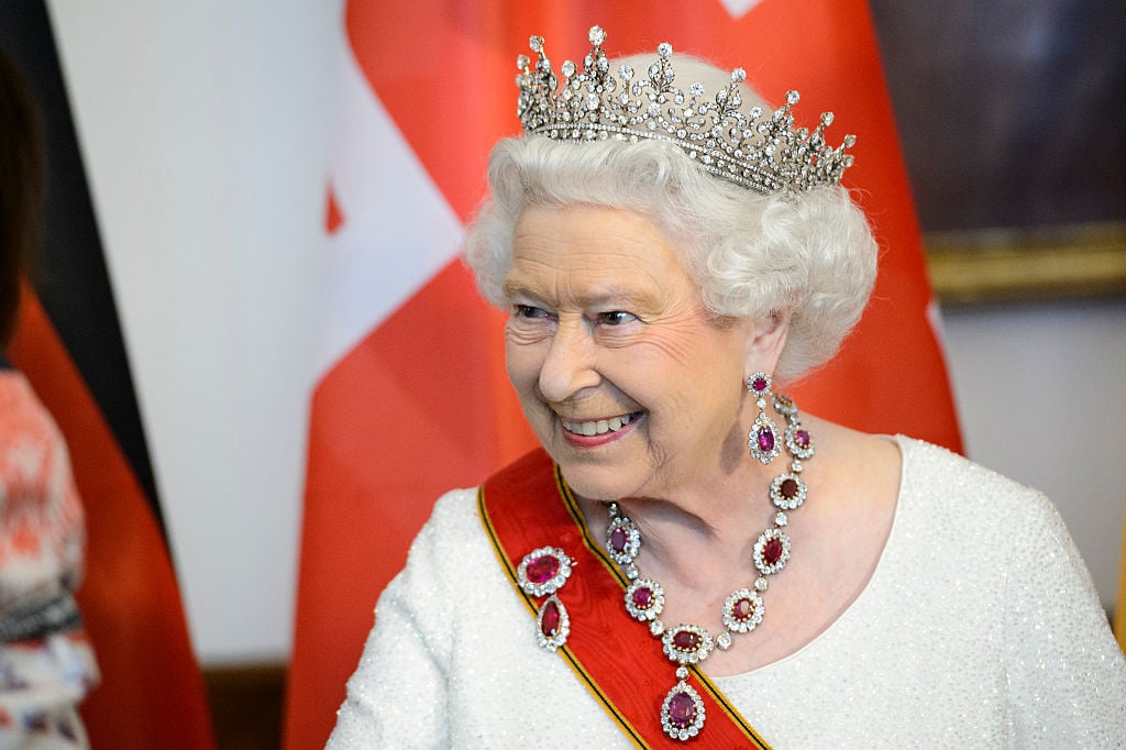 Queen Elizabeth II wearing a sash and tiara. Queen Elizabeth II wearing a sash and tiara.