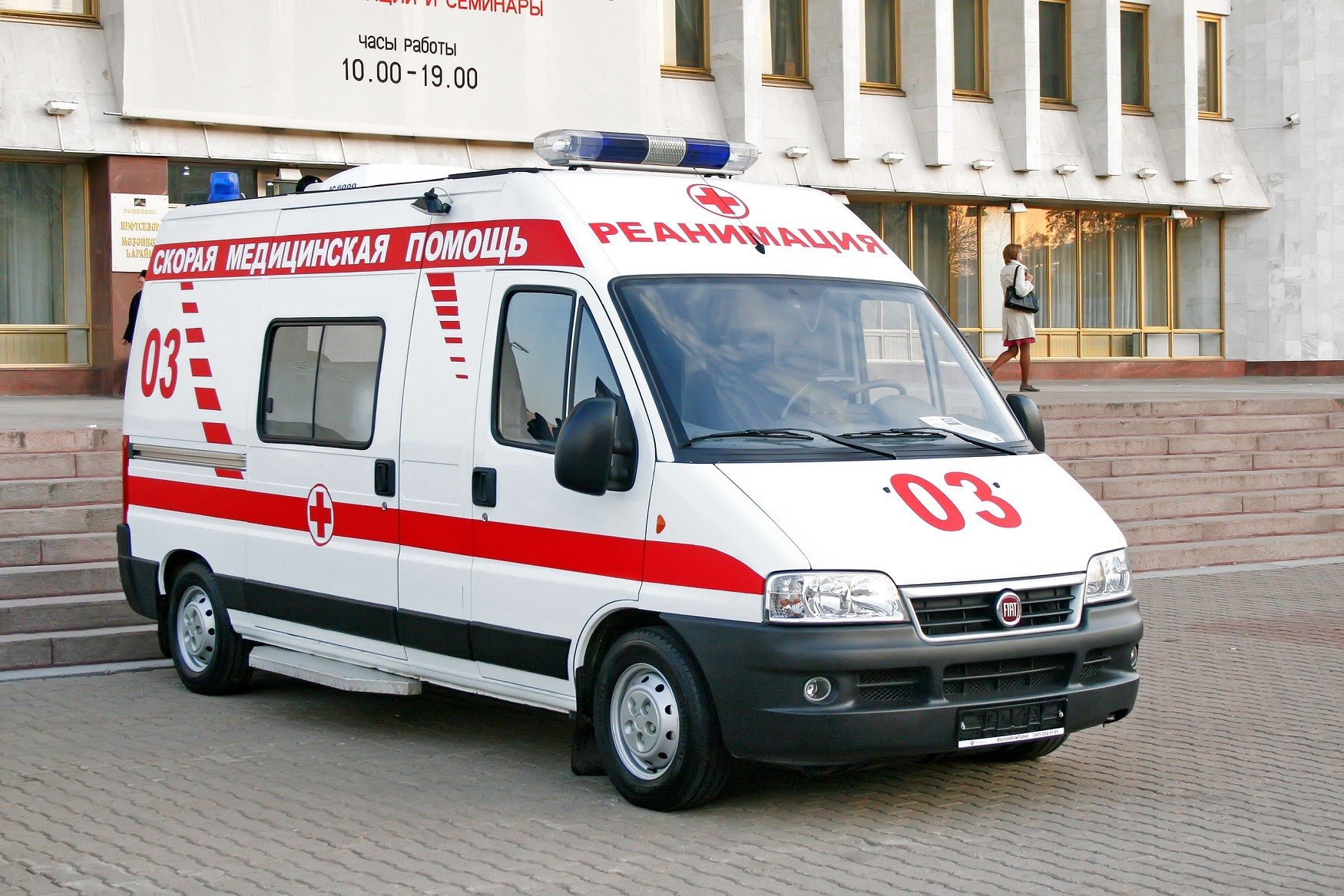 White Fiat Ducato ambulance vehicle parked at the city street in Russia