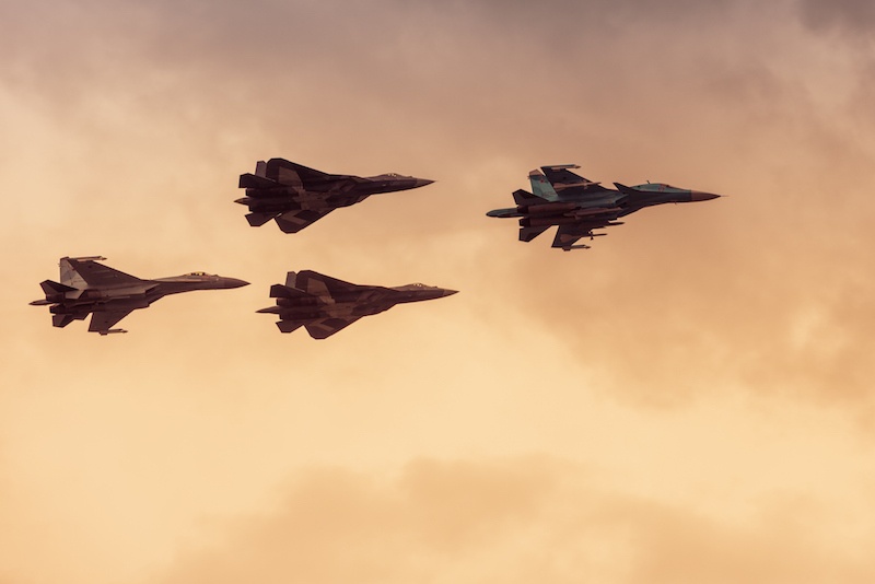 The SU-57s flying in the air. The SU-57s flying in the air.
