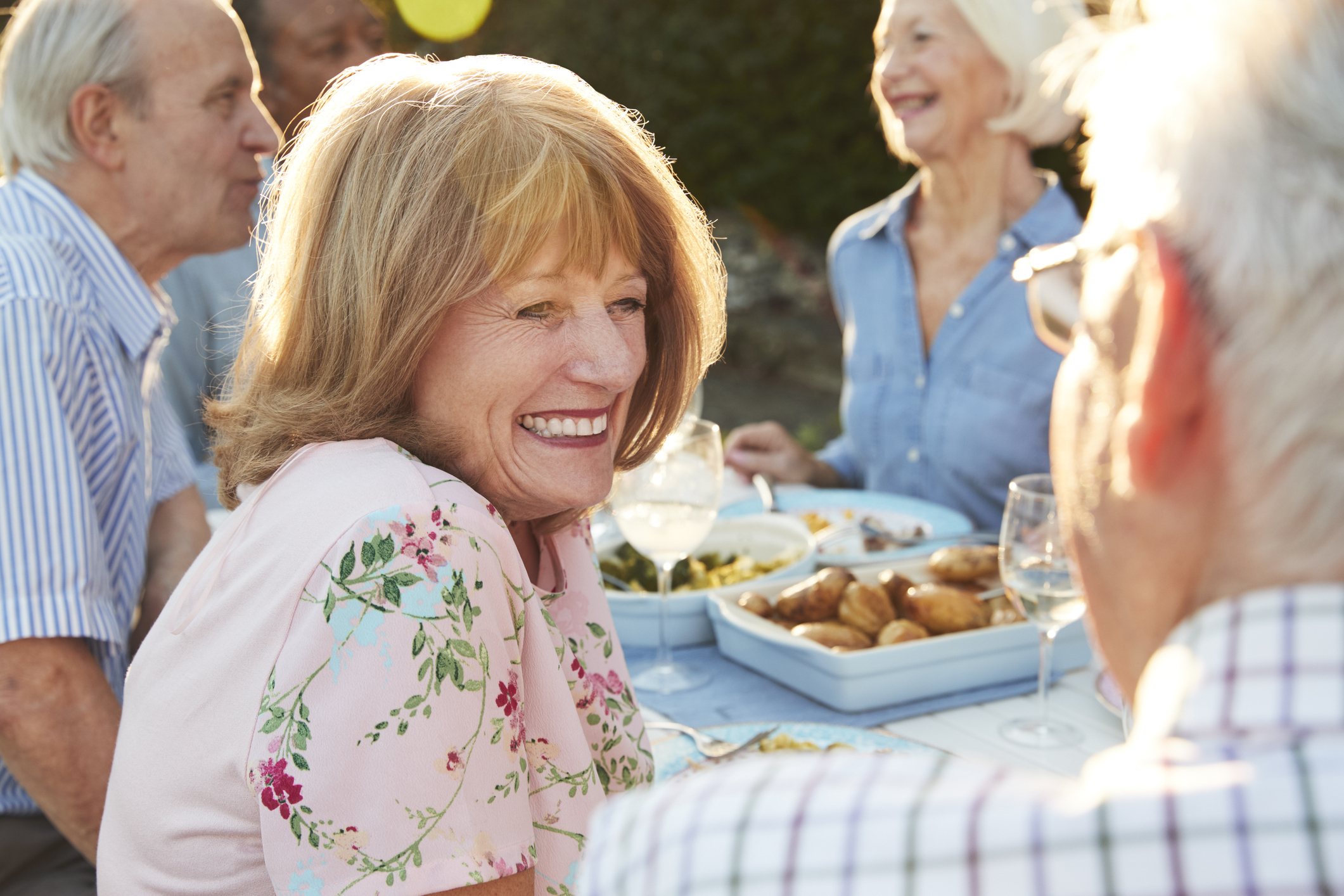 Seniors Enjoying Outdoor Dinner Party Seniors Enjoying Outdoor Dinner Party