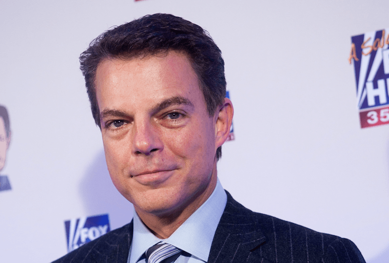Shepard Smith smiling while on a red carpet. Shepard Smith smiling while on a red carpet.