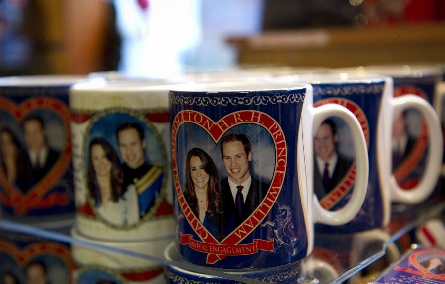 Souvenir mugs for the royal wedding of Britain's Prince William and Kate Middleton are pictured in a shop in central London