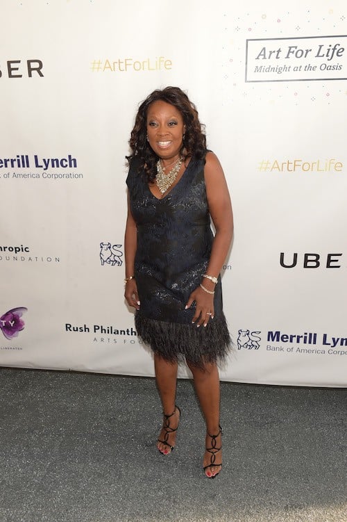 Star Jones posing for photographers at an event. Star Jones posing for photographers at an event.