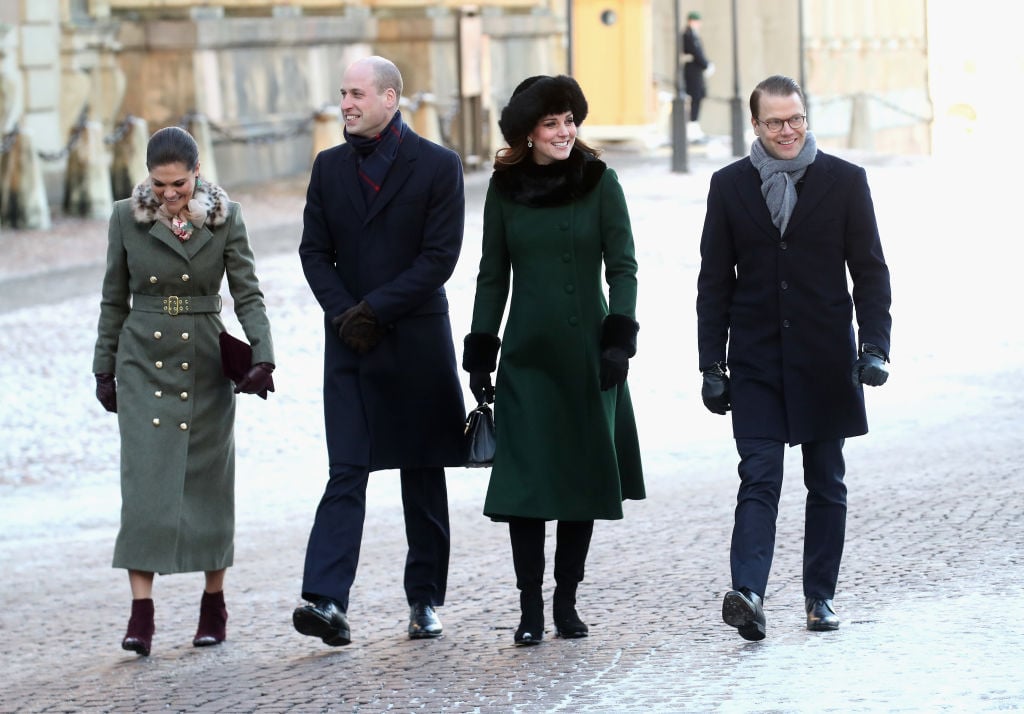 Crown Princess Victoria of Sweden, Prince William, Duke of Cambridge, Catherine, Duchess of Cambridge and Prince Daniel of Sweden walk through the cobbled streets of Stockholm