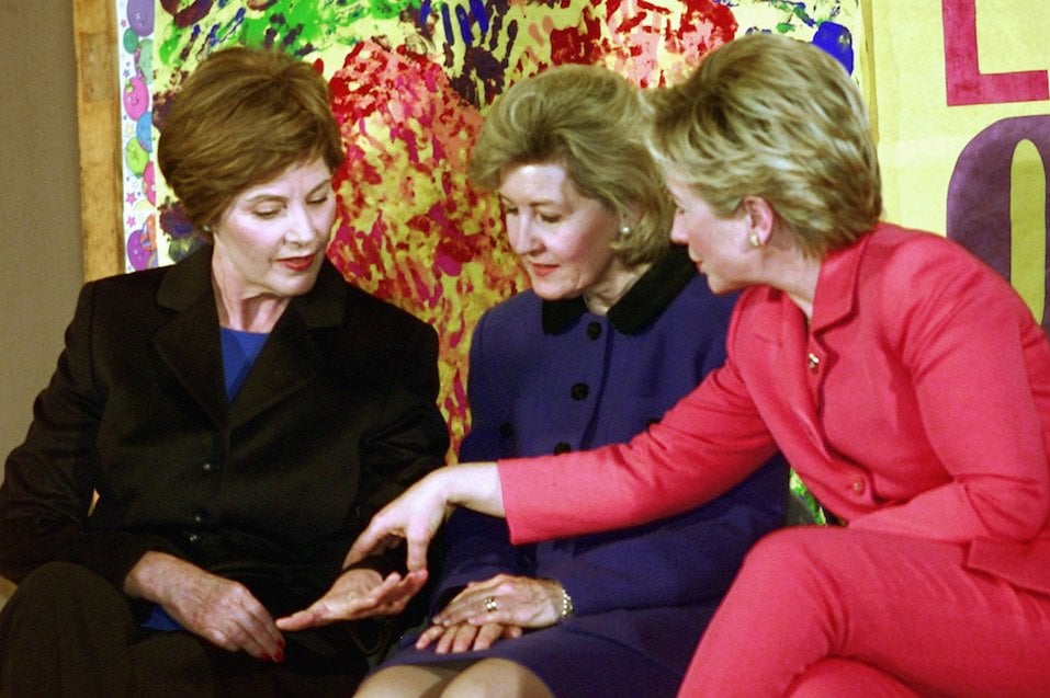 US First Lady Laura Bush shows her ring to US Senator Kay Bailey Hutchison and US Senator Hillary Clinton as they talk among themselves
