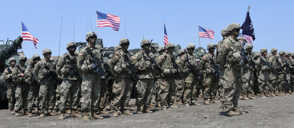 US soldiers stand at attention during the official closing ceremony of the multinational military exercise