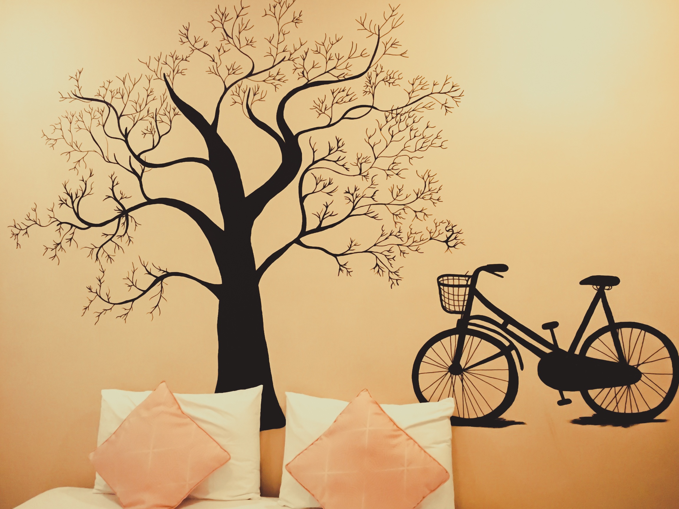 Black tree and bicycle wall sticker in the pink room