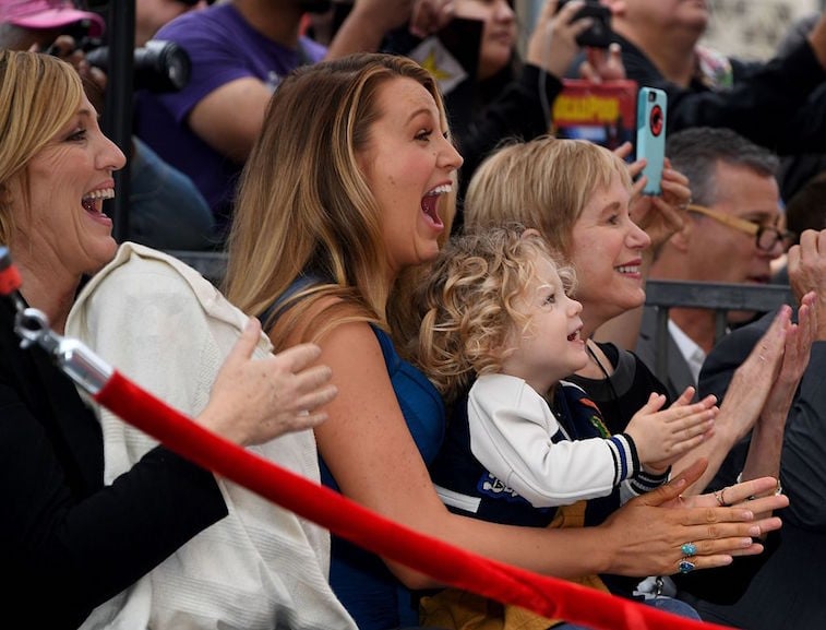 Blake Lively and her daughter James cheer at the Hollywood Walk of Fame ceremony honoring her husband actor Ryan Reynolds with a star in Hollywood, California on December 15, 2016.