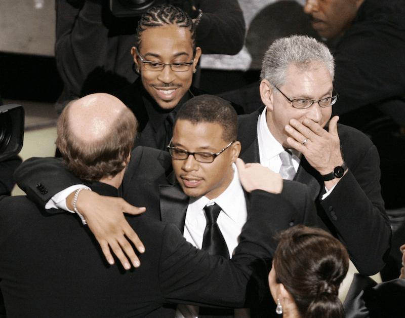 Los Angeles, UNITED STATES: Members of 'Crash' react after winning Best Picture 05 March 2006 during the 78th Academy Awards at the Kodak Theater in Hollywood, California. AFP PHOTO/Timothy A. CLARY (Photo credit should read TIMOTHY A. CLARY/AFP/Getty Images)