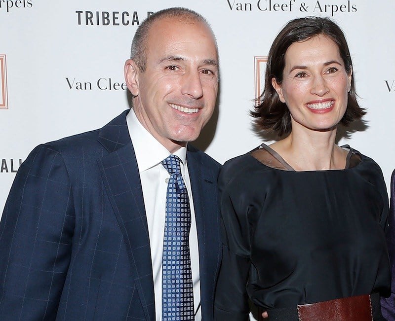 Matt Lauer and his wife smile at an event Matt Lauer and his wife smile at an event