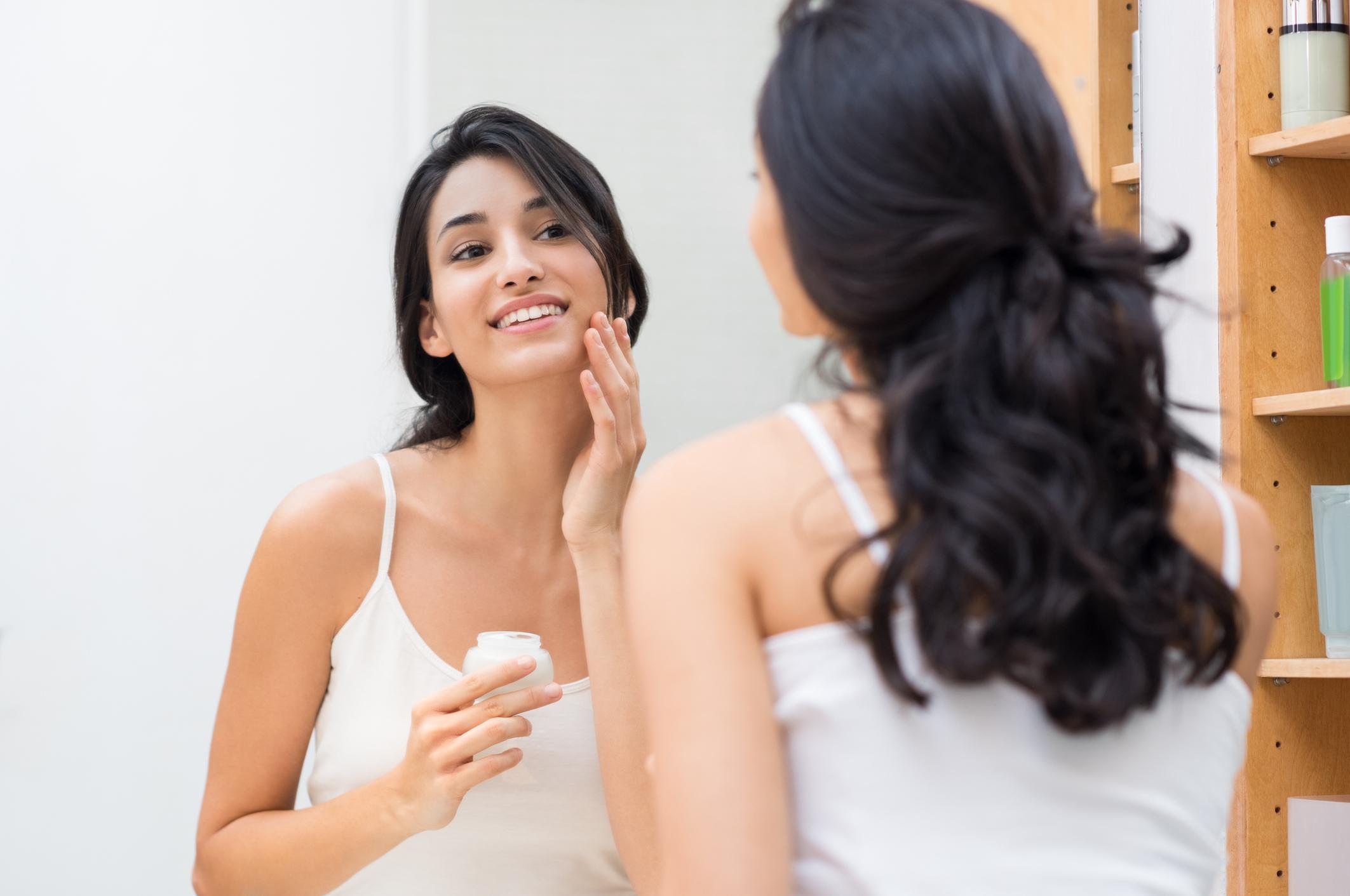 applying moisturizer applying moisturizer