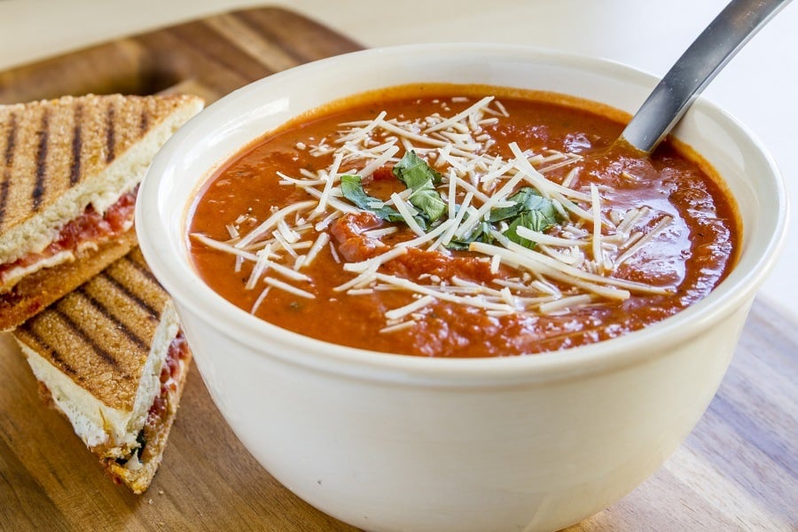 tomato and basil soup sprinkled with parmesan cheese
