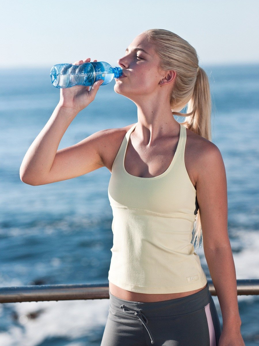 woman drinking water woman drinking water