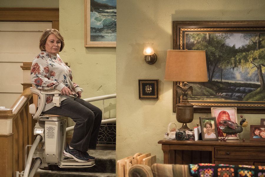 Roseanne on a chair
