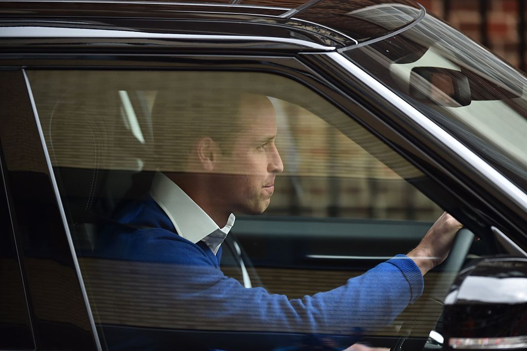 Britain's Prince William, Duke of Cambridge, drives himself away as he leaves the Lindo Wing at St Mary's Hospital