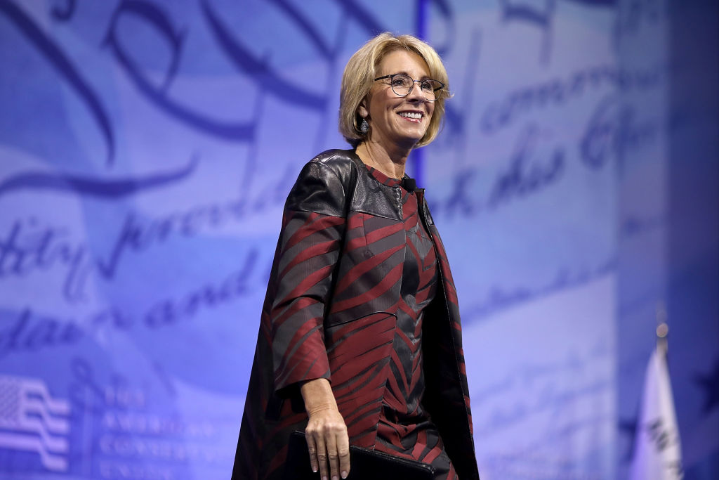 Betsy DeVos standing Betsy DeVos standing