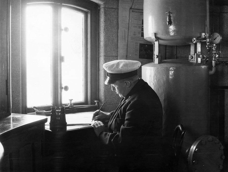 Captain writing memo Captain writing memo