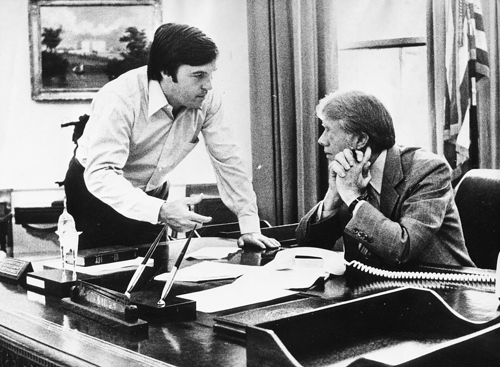 Jimmy Carter And Hamilton Jordan in the Oval Office at desk