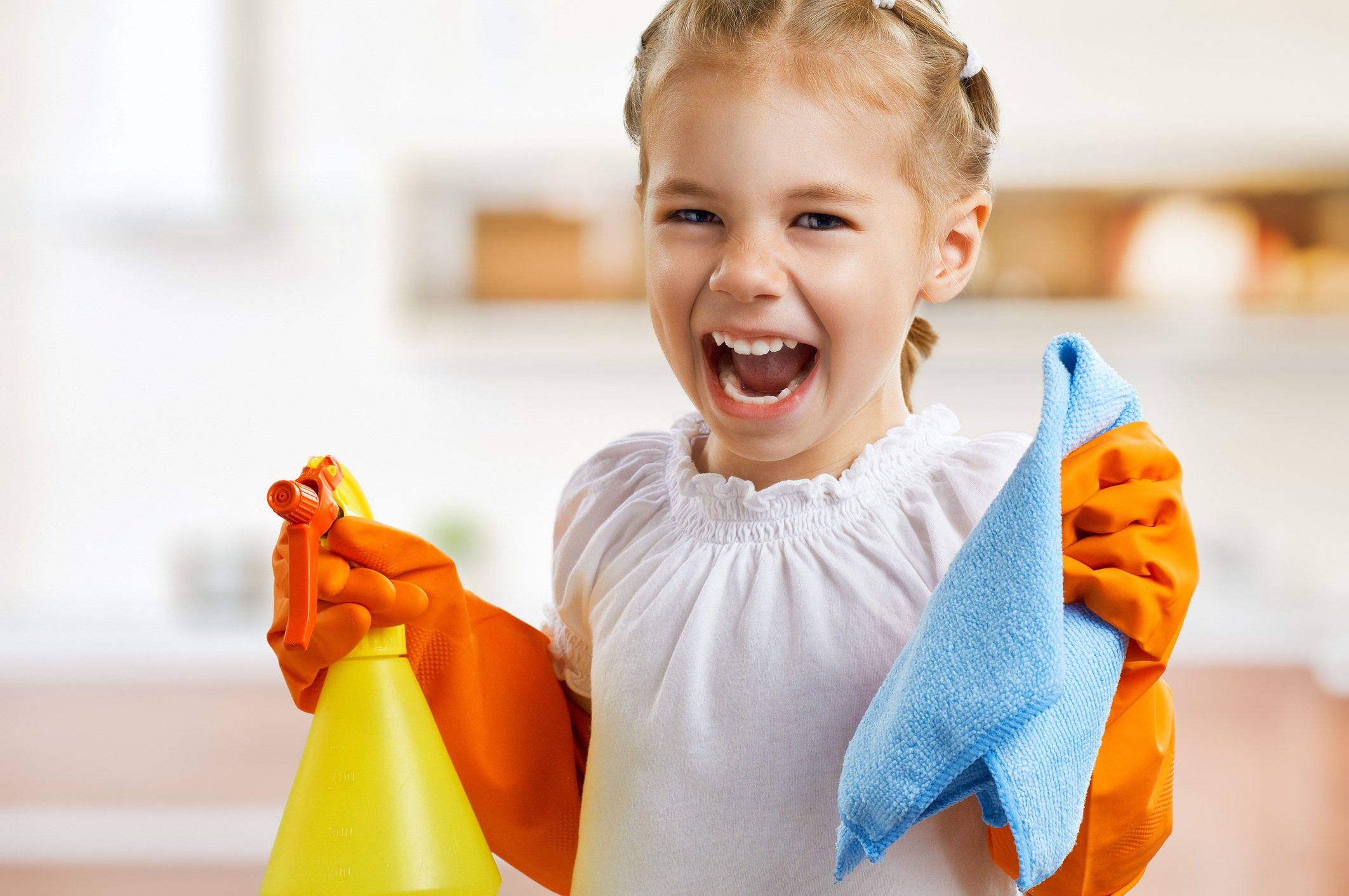 Little girl doing chores and cleaning
