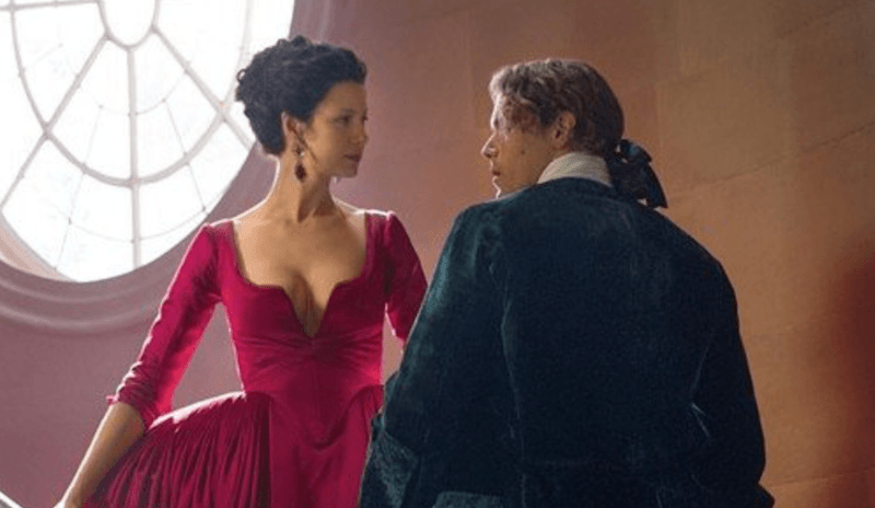 Claire and Jaimie standing together on a staircase.  Claire and Jaimie standing together on a staircase.