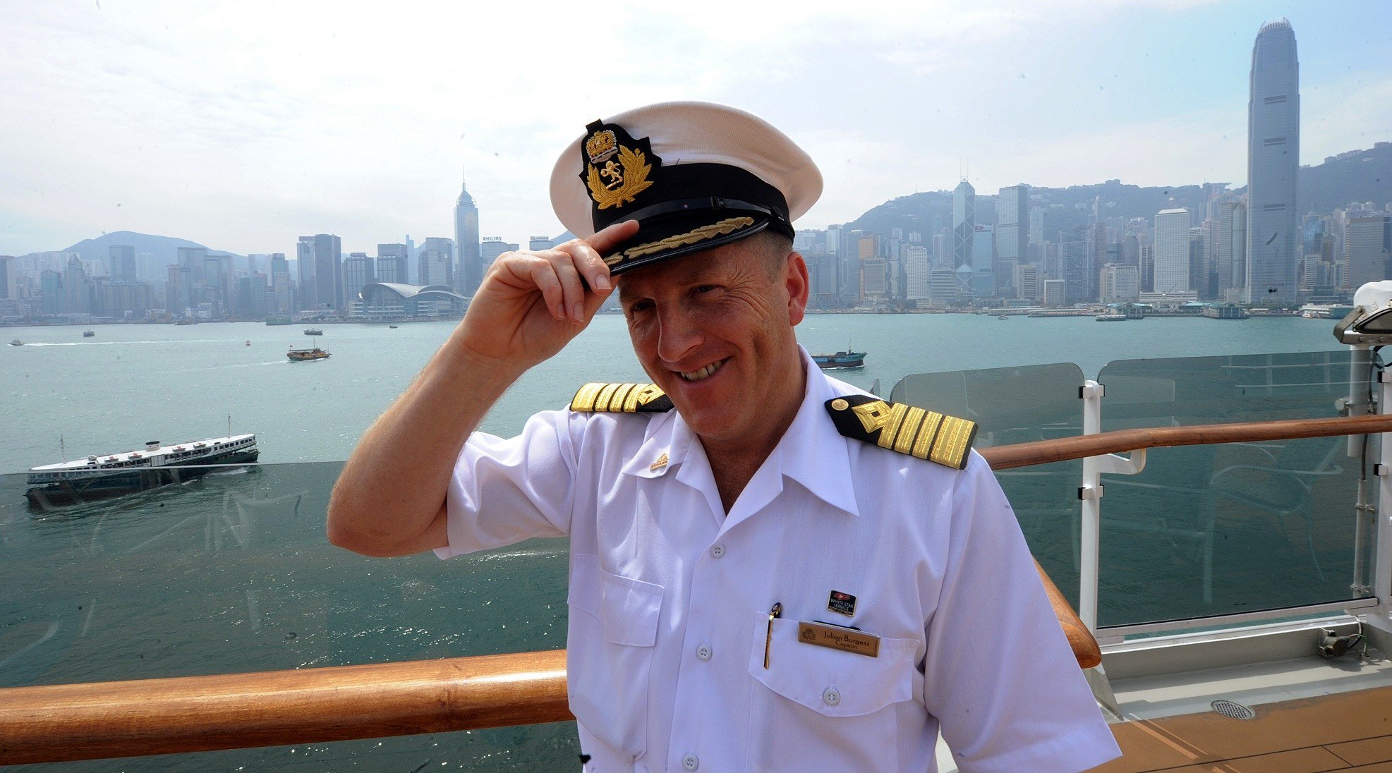 Captain Julian Burgess stands on board Queen Elizabeth cruise ship 