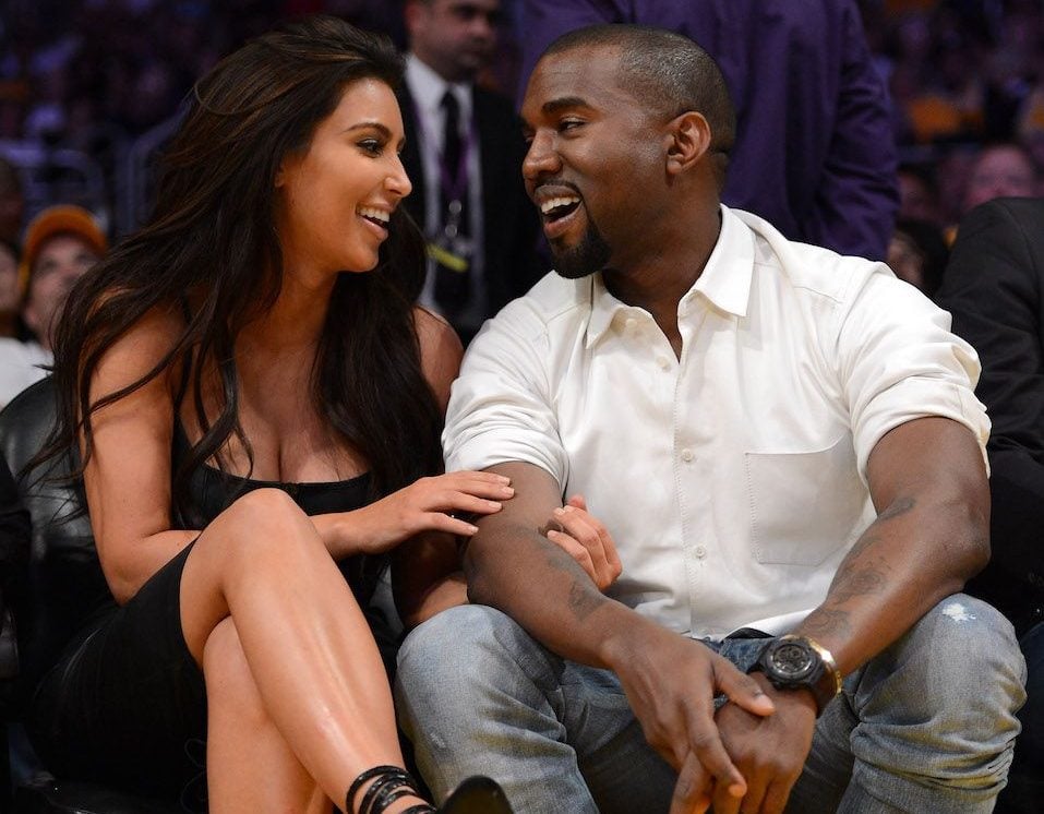 Kim Kardashian and rapper Kanye West talk from their courtside seats as the Los Angeles Lakers Kim Kardashian and rapper Kanye West talk from their courtside seats as the Los Angeles Lakers